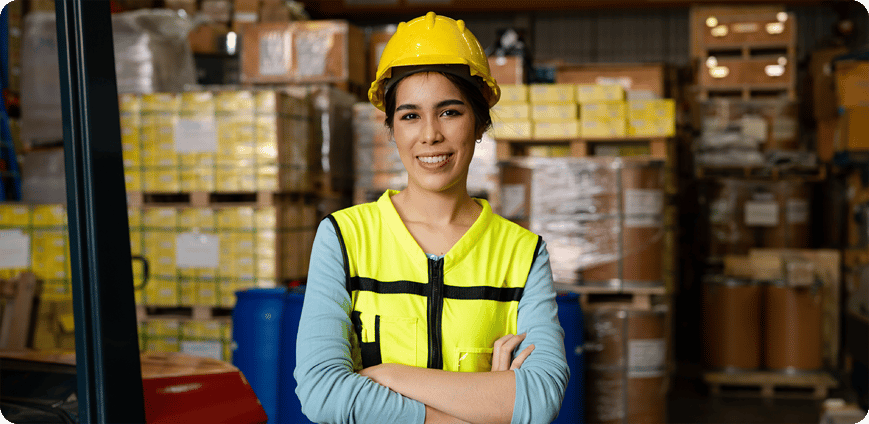 Warehouse worker in yellow high vis vest and hard hat